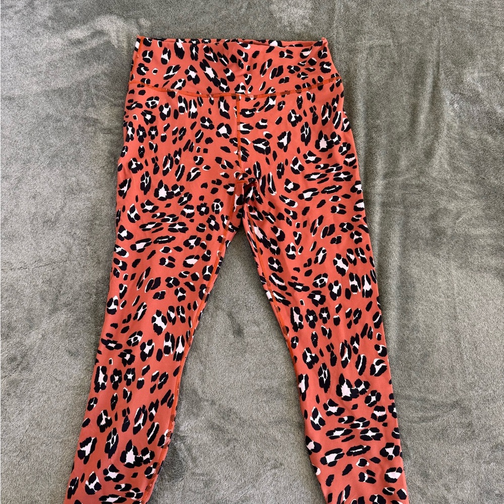 Fabletics Woman Wild Print Leggings - Orange and Black